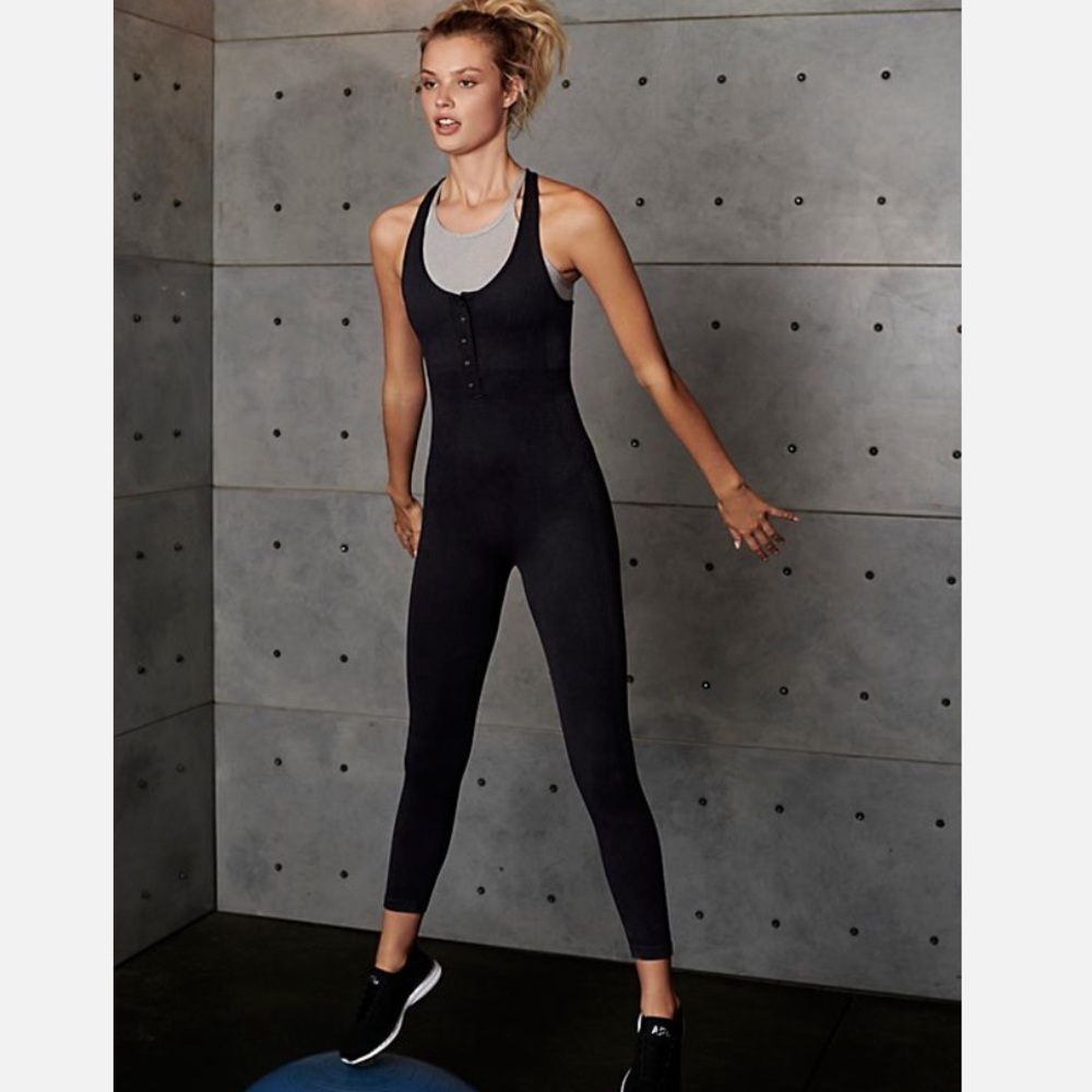 Free People Movement black ribbed Revive onesie